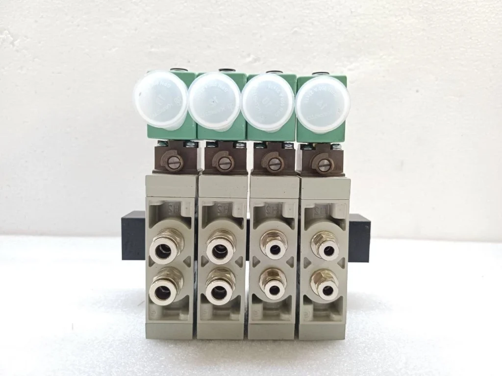 Multi-station pneumatic solenoid valve manifold (4-station) with 24V coils